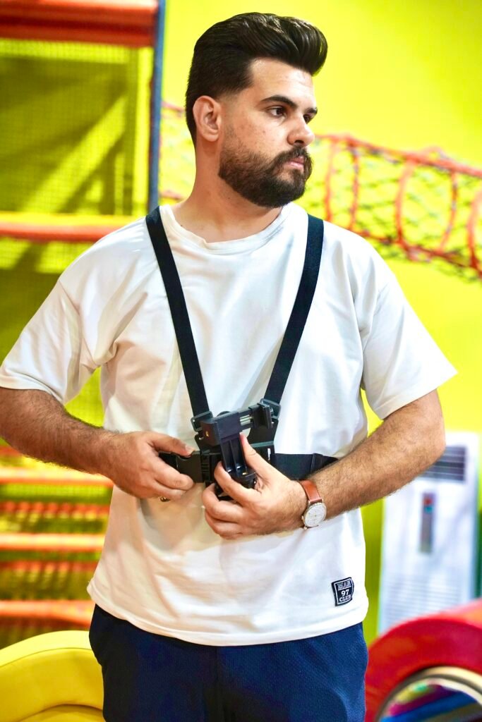 Ahmad Tashani photographer with his camera